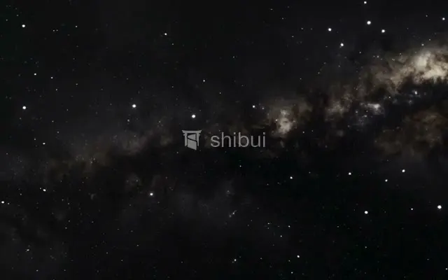 Nuvens de poeira cósmica escuras e estrelas brilhantes em um fundo espacial escuro.