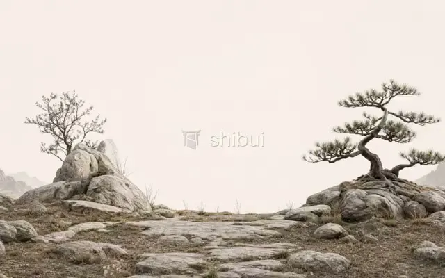 Um caminho de pedras leva a duas árvores bonsai em um cenário rochoso e árido com montanhas ao fundo.