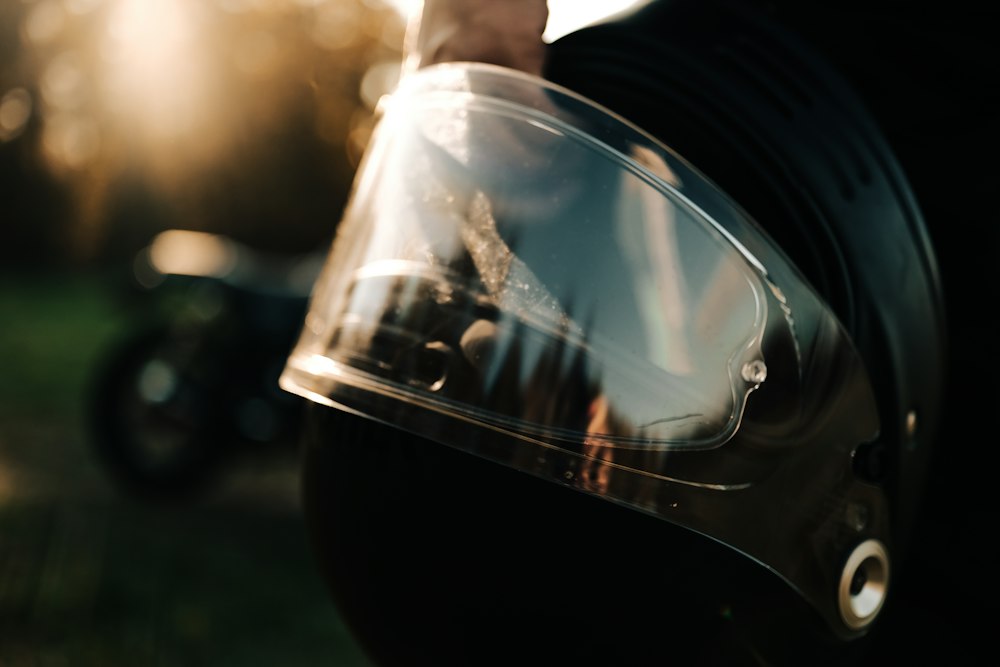 Rider holding a motorcycle helmet