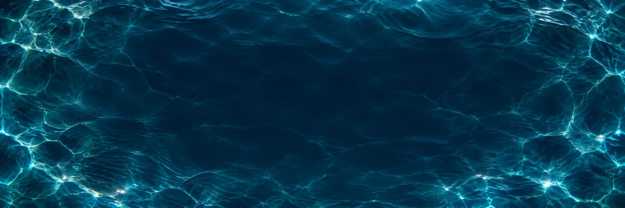 Sunlight dancing across clear pool water