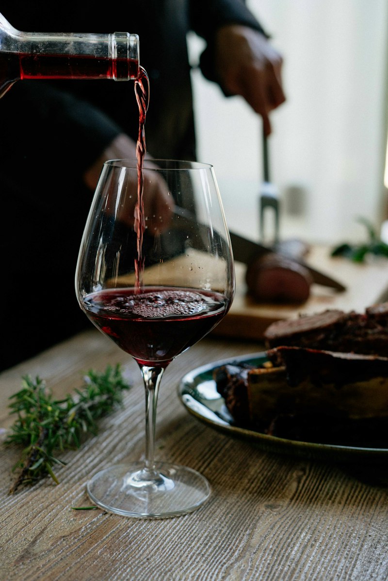 Wine being poured in the tasting room of Maison Aurelia