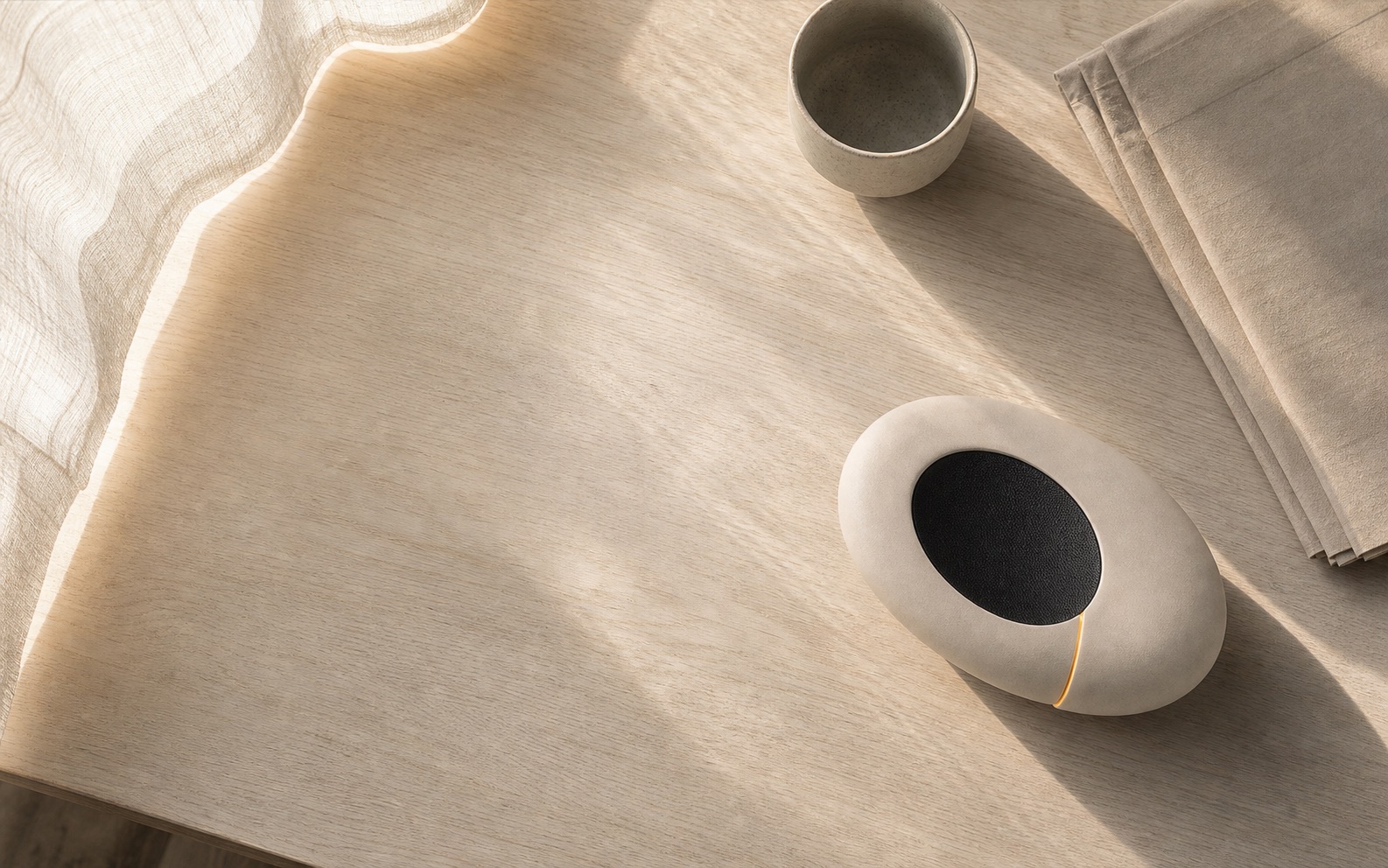 Overhead morning study of ECHO/01 on pale ash wood