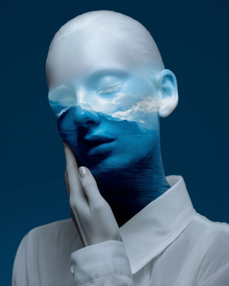 Surreal double-exposure portrait with seascape