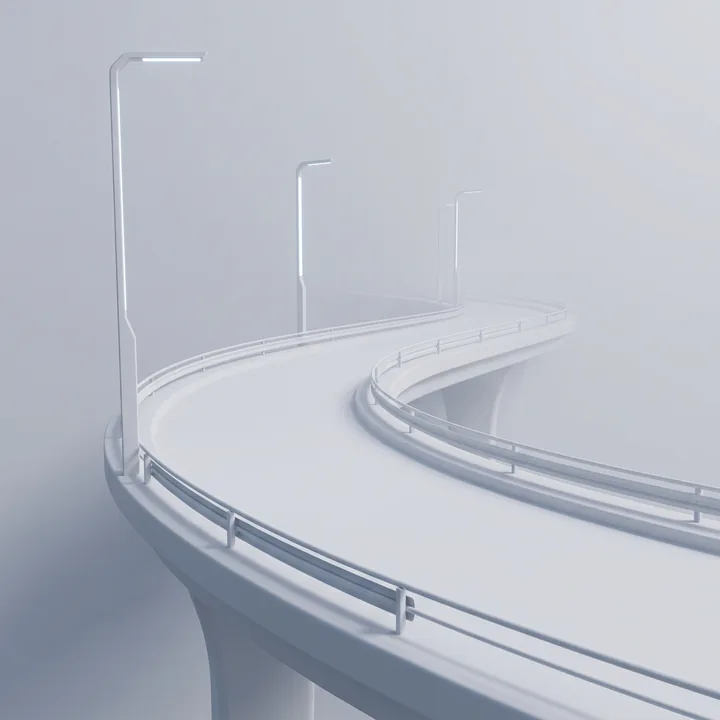 Fog sitting over an empty concrete overpass at dawn