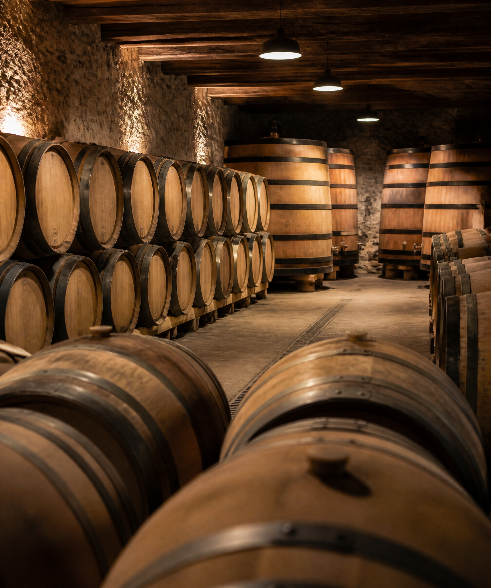 Traditional barrels in a working cellar